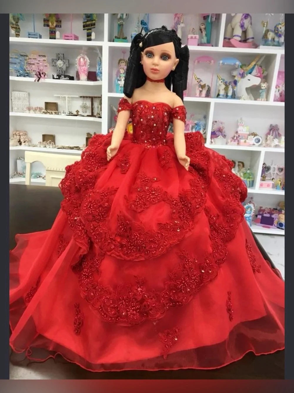 24-inch Quinceañera Keepsake Doll Wearing A Layered, sparkly Red Gown.